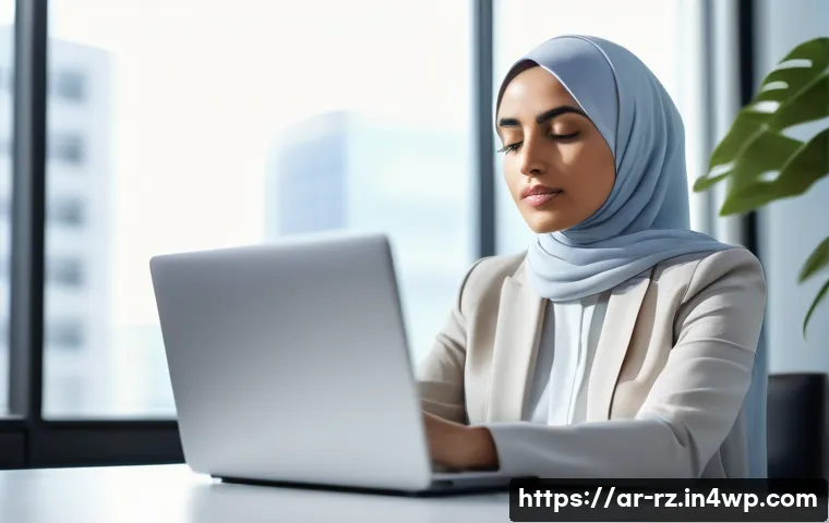 마인드풀테크와 직업 만족도 향상 - A professional Middle Eastern woman sitting calmly at her modern office desk practicing mindful brea...